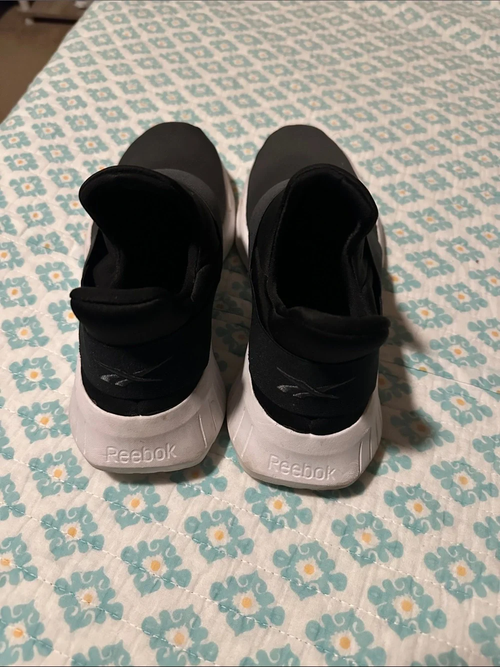 Women’s Reebok Slip-On Athletic Sneakers in Black and White